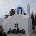 A small church with a blue dome